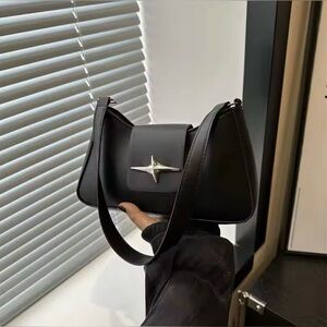 Cute black shoulder bag with silver star